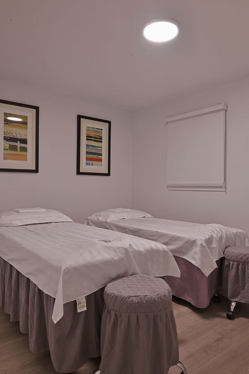 Massage therapy room with twin beds